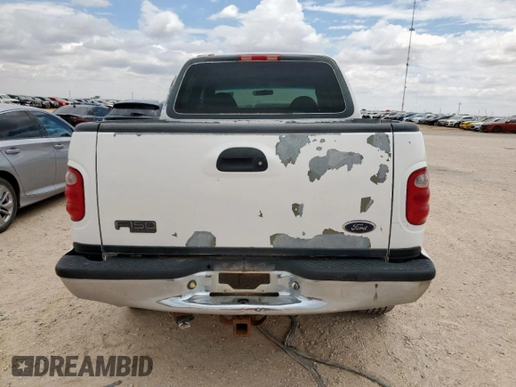 2001 Ford F-150 XLT z VIN 1FTRW08L31KF27329, wystawiony jako Copart lot #61018835 z przebiegiem Nie podano mil oraz Czysty tytuł • Clean title. Historia ofert i sprzedaży dostępna na DreamBid. Obrazek 6.