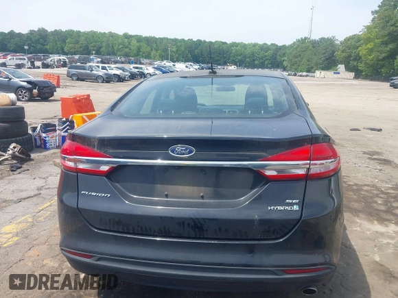 2017 Ford Fusion Hybrid SE with VIN 3FA6P0LU4HR358501, listed as a IAAI auction lot 42287032 with 165,456 mi miles and . Bid and sale history available at DreamBid. Image 16.