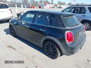 2015 MINI Hardtop 4 Door S with VIN WMWXU3C53F2B56459, listed as a IAAI auction lot 41400624 with 233,850 mi miles and . Bid and sale history available at DreamBid. Image 3.
