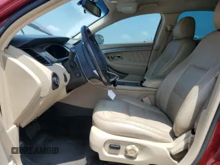 2014 Ford Taurus SEL z VIN 1FAHP2E83EG153033, wystawiony jako Copart lot #55400835 z przebiegiem 96 612 mil mil oraz Szkoda całkowita • Salvage title. Historia ofert i sprzedaży dostępna na DreamBid. Obrazek 7.