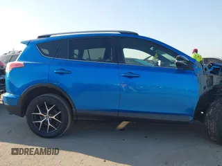 2018 Toyota RAV4 SE with VIN JTMNFREV3JJ156865, listed as a IAAI auction lot 41986697 with 124,979 mi miles and . Bid and sale history available at DreamBid. Image 14.