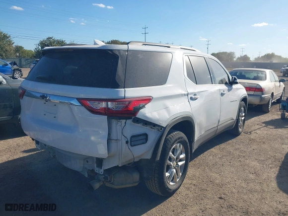 2019 Chevrolet Traverse LT Leather with VIN 1GNERHKW2KJ235242, listed as a IAAI auction lot 40596424 with 97,979 mi miles. Bid and sale history available at carsss.com. Image 4.