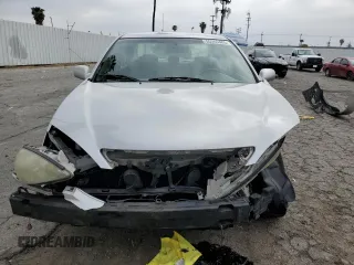 2005 Toyota Camry LE with VIN 4T1BF32KX5U601192, listed as a Copart auction lot 55365485 with 153,251 mi miles and Salvage Title. Bid and sale history available at DreamBid. Image 5.