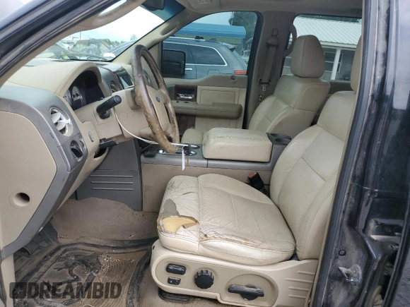 2004 Ford F-150 XLT with VIN 1FTPW14574KB96621, listed as a Copart auction lot 61137655 with 220,659 mi miles and Salvage title. Bid and sale history available at DreamBid. Image 7.