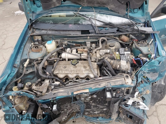 1994 Ford Escort z VIN 1FARP15J1RW125762, wystawiony jako Copart lot #85853184 z przebiegiem 75 229 mil mil oraz Szkoda całkowita • Salvage title. Historia ofert i sprzedaży dostępna na DreamBid. Obrazek 11.