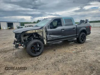 2020 Ford F-150 XL with VIN 1FTEW1E57LKE84711, listed as a Copart auction lot 60990165 with 70,560 mi miles and Clean title. Bid and sale history available at DreamBid. Image 1.