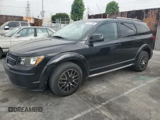 2014 Dodge Journey Crossroad with VIN 3C4PDCGG1ET264863, listed as a Copart auction lot 61877585 with 129,819 mi miles and Clean title. Bid and sale history available at DreamBid. Image 1.