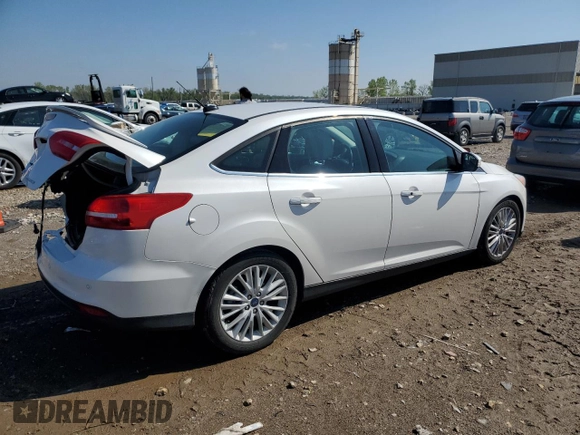 2018 Ford Focus Titanium with VIN 1FADP3J21JL294061, listed as a Copart auction lot 53827375 with 194,577 mi miles and Salvage title. Bid and sale history available at DreamBid. Image 3.