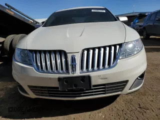 2009 Lincoln MKS with VIN 1LNHM94R59G611484, listed as a Copart auction lot 43998775 with 118,706 mi miles and Salvage Title. Bid and sale history available at DreamBid. Image 5.