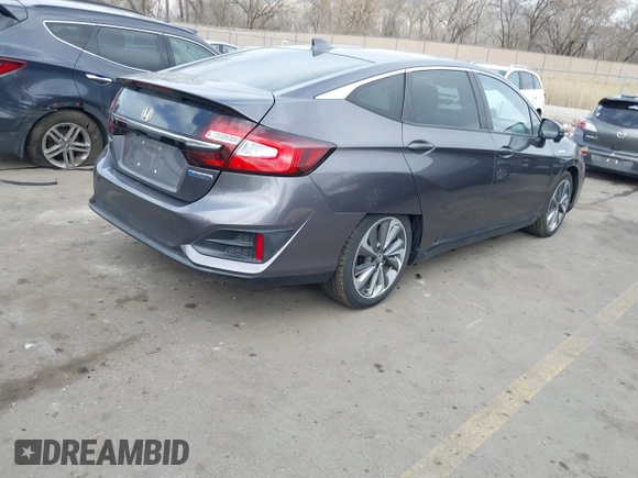 2019 Honda Clarity Plug-In Hybrid with VIN JHMZC5F18KC006818, listed as a IAAI auction lot 41905854 with 85,135 mi miles. Bid and sale history available at carsss.com. Image 4.