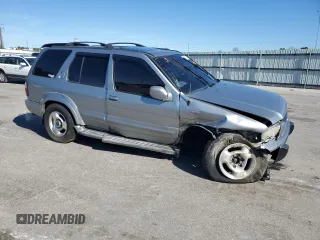 2000 Infiniti QX4 with VIN JNRAR07Y1YW077992, listed as a Copart auction lot 45572015 with 202,385 mi miles and Salvage Title. Bid and sale history available at DreamBid. Image 4.