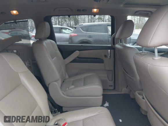 2014 Honda Odyssey Touring with VIN 5FNRL5H97EB117971, listed as a IAAI auction lot 41794324 with 198,191 mi miles and . Bid and sale history available at DreamBid. Image 8.