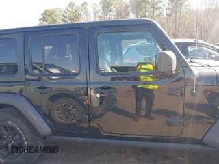 2020 Jeep Wrangler Unlimited Black and Tan with VIN 1C4HJXDGXLW219078, listed as a IAAI auction lot 41783437 with 59,137 mi miles and . Bid and sale history available at DreamBid. Image 14.