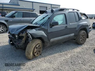 2015 Nissan Xterra Pro-4X z VIN 5N1AN0NWXFN664591, wystawiony jako Copart lot #60423525 z przebiegiem 246 477 mil mil oraz Szkoda całkowita • Salvage title. Historia ofert i sprzedaży dostępna na DreamBid. Obrazek 1.