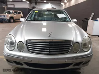 2006 Mercedes-Benz E-Class 3.5L with VIN WDBUF87J76X182677, listed as a IAAI auction lot 42016237 with 150,085 mi miles. Bid and sale history available at carsss.com. Image 12.