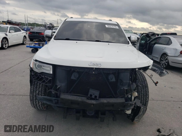 2015 Jeep Grand Cherokee Summit with VIN 1C4RJEJG8FC131925, listed as a Copart auction lot 55270785 with 130,425 mi miles and Salvage title. Bid and sale history available at DreamBid. Image 5.