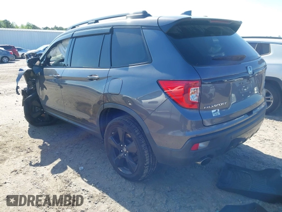 2019 Honda Passport Elite with VIN 5FNYF8H04KB004657, listed as a IAAI auction lot 41993974 with 90,964 mi miles and . Bid and sale history available at DreamBid. Image 3.