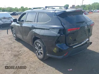 2023 Toyota Highlander L with VIN 5TDKDRBHXPS030361, listed as a IAAI auction lot 42230419 with 59,404 mi miles and . Bid and sale history available at DreamBid. Image 3.
