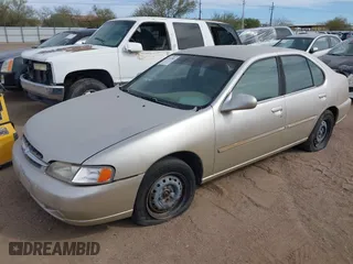 1998 Nissan Altima XE with VIN 1N4DL01DXWC253625, listed as a IAAI auction lot 41517801 with 194,609 mi miles. Bid and sale history available at carsss.com. Image 2.