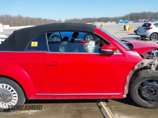 2013 Volkswagen Beetle 2.5L with VIN 3VW5P7AT1DM833048, listed as a IAAI auction lot 41769453 with Not Provided miles and . Bid and sale history available at DreamBid. Image 13.