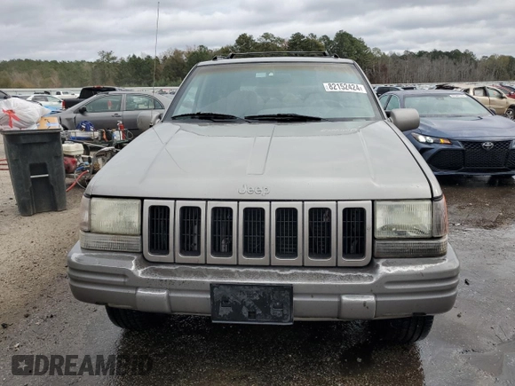 1997 Jeep Grand Cherokee Limited with VIN 1J4GZ78Y0VC682949, listed as a Copart auction lot 82152424 with 194,576 mi miles and Salvage Title. Bid and sale history available at carsss.com. Image 5.