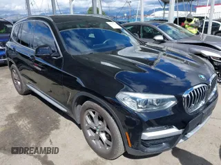 2021 BMW X3 sDrive30i with VIN 5UXTY3C07M9G14775, listed as a IAAI auction lot 41765728 with 54,612 mi miles. Bid and sale history available at carsss.com. Image 1.