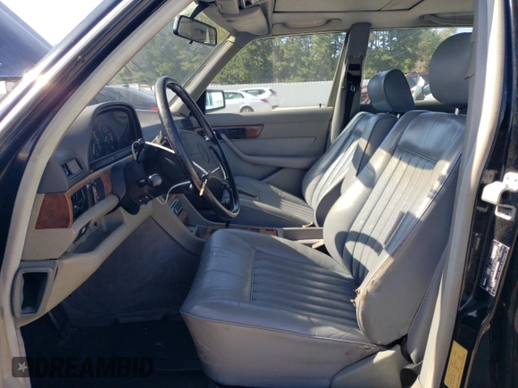 1987 Mercedes-Benz 560 with VIN WDBCA39D3HA355282, listed as a Copart auction lot 74798524 with 200,535 mi miles and Salvage Title. Bid and sale history available at DreamBid. Image 7.