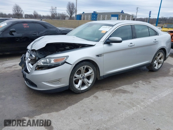 2012 Ford Taurus SHO z VIN 1FAHP2KT6CG142954, wystawiony jako IAAI lot #41526760 z przebiegiem 187 887 mil mil oraz . Historia ofert i sprzedaży dostępna na DreamBid. Obrazek 2.