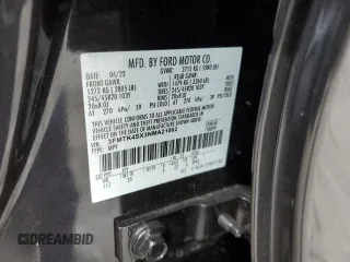 2022 Ford Mustang Mach-E GT z VIN 3FMTK4SX3NMA21062, wystawiony jako Copart lot #70915202 z przebiegiem Nie podano mil oraz . Historia ofert i sprzedaży dostępna na DreamBid. Obrazek 13.