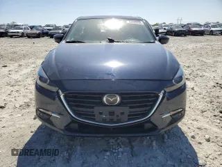 2017 Mazda 3 Grand Touring z VIN JM1BN1M3XH1117241, wystawiony jako Copart lot #53499295 z przebiegiem 63 886 mil mil oraz Szkoda całkowita • Salvage title. Historia ofert i sprzedaży dostępna na DreamBid. Obrazek 5.