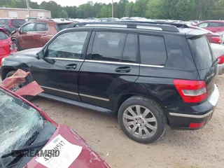 2010 Mercedes-Benz GLK with VIN WDCGG8HB0AF321592, listed as a IAAI auction lot 42114612 with 156,099 mi miles. Bid and sale history available at carsss.com. Image 3.