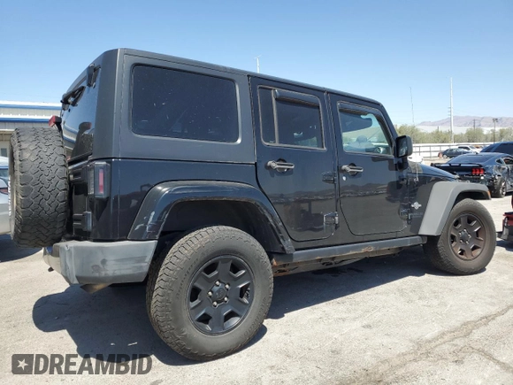 2015 Jeep Wrangler Unlimited Freedom with VIN 1C4HJWDG0FL598947, listed as a Copart auction lot 61794214 with 125,778 mi miles and Salvage title. Bid and sale history available at DreamBid. Image 3.