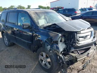 2009 Honda Pilot EX with VIN 5FNYF48449B020508, listed as a IAAI auction lot 42009926 with 196,806 mi miles. Bid and sale history available at carsss.com. Image 1.