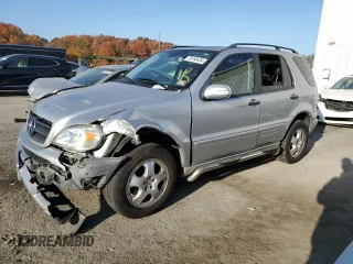 2002 Mercedes-Benz M-Class with VIN 4JGAB54E32A365833, listed as a Copart auction lot 76158434 with 175,244 mi miles and Salvage Title. Bid and sale history available at carsss.com. Image 1.