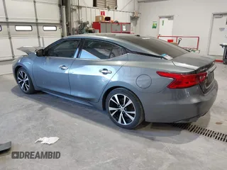 2018 Nissan Maxima SL z VIN 1N4AA6APXJC374220, wystawiony jako IAAI lot #42018130 z przebiegiem 119 776 mil mil oraz . Historia ofert i sprzedaży dostępna na DreamBid. Obrazek 3.