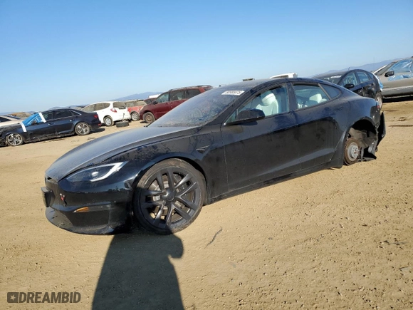 2023 Tesla Model S with VIN 5YJSA1E52PF499802, listed as a Copart auction lot 88585675 with 0 mi miles and Salvage Title. Bid and sale history available at carsss.com. Image 1.