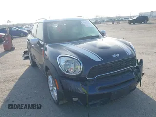 2013 MINI Countryman S ALL4 with VIN WMWZC5C58DWP33707, listed as a IAAI auction lot 41835234 with 98,441 mi miles and . Bid and sale history available at DreamBid. Image 1.