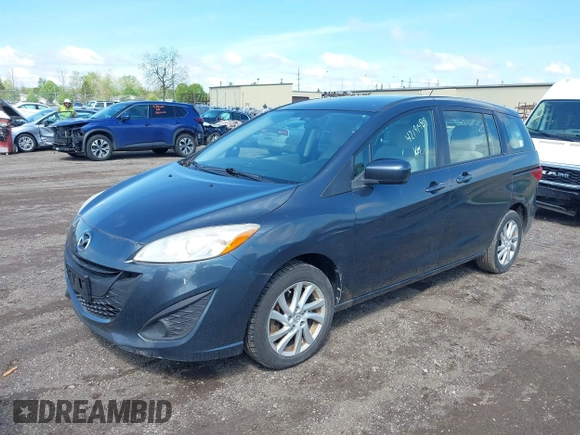 2012 Mazda 5 Sport with VIN JM1CW2BL4C0107491, listed as a IAAI auction lot 42191489 with 108,411 mi miles and . Bid and sale history available at DreamBid. Image 2.