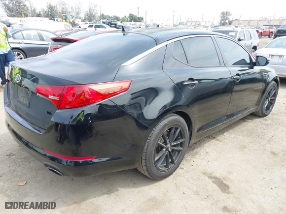 2011 Kia Optima LX with VIN KNAGM4A78B5117530, listed as a IAAI auction lot 42047302 with 171,168 mi miles. Bid and sale history available at carsss.com. Image 4.