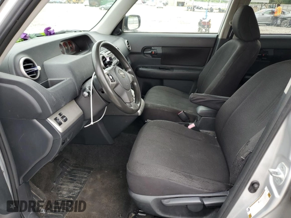 2009 Scion xB z VIN JTLKE50E591067708, wystawiony jako Copart lot #56297005 z przebiegiem 206 638 mil mil oraz Szkoda całkowita • Salvage title. Historia ofert i sprzedaży dostępna na DreamBid. Obrazek 7.