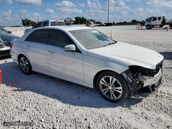 2015 Mercedes-Benz E-Class E 250 BlueTEC Luxury with VIN WDDHF0EB8FB157452, listed as a Copart auction lot 74910084 with 121,993 mi miles and Salvage Title. Bid and sale history available at carsss.com. Image 4.