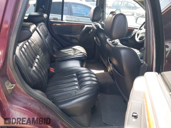 1999 Jeep Grand Cherokee Limited with VIN 1J4GW68S9XC653855, listed as a IAAI auction lot 42433370 with 275,724 mi miles and . Bid and sale history available at DreamBid. Image 8.