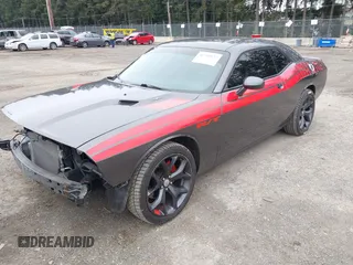 2014 Dodge Challenger R/T Plus z VIN 2C3CDYBT1EH177266, wystawiony jako IAAI lot #41798977 z przebiegiem 109 489 mil mil oraz . Historia ofert i sprzedaży dostępna na DreamBid. Obrazek 18.