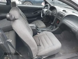 1997 Ford Mustang with VIN 1FALP4041VF129619, listed as a IAAI auction lot 41440766 with 135,934 mi miles. Bid and sale history available at carsss.com. Image 5.