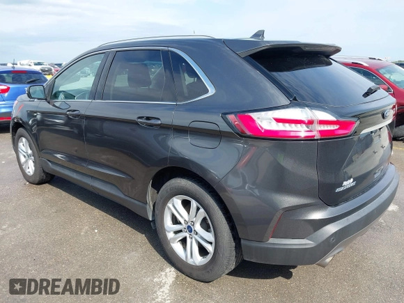 2020 Ford Edge SEL z VIN 2FMPK3J9XLBA54556, wystawiony jako IAAI lot #42179907 z przebiegiem 63 449 mil mil oraz . Historia ofert i sprzedaży dostępna na DreamBid. Obrazek 3.