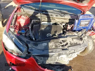 2015 Mazda CX-5 Sport z VIN JM3KE2BE7F0516869, wystawiony jako IAAI lot #41866488 z przebiegiem 131 237 mil mil oraz . Historia ofert i sprzedaży dostępna na DreamBid. Obrazek 10.
