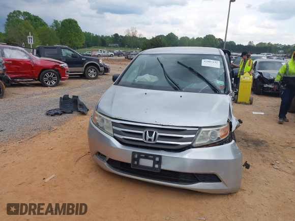 2013 Honda Odyssey LX with VIN 5FNRL5H27DB075559, listed as a IAAI auction lot 42007141 with Not Provided miles and . Bid and sale history available at carsss.com. Image 11.