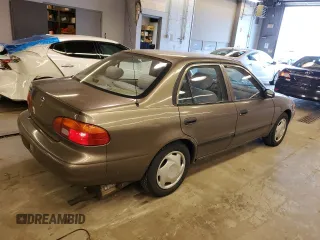 2000 Chevrolet Prizm z VIN 1Y1SK528XYZ429393, wystawiony jako Copart lot #46506584 z przebiegiem 78 028 mil mil oraz Tytuł czysty. Historia ofert i sprzedaży dostępna na DreamBid. Obrazek 3.