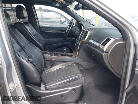 2014 Jeep Grand Cherokee Overland with VIN 1C4RJECG0EC291048, listed as a IAAI auction lot 41883941 with 81,871 mi miles. Bid and sale history available at carsss.com. Image 5.