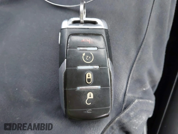 2019 Ram 1500 Rebel z VIN 1C6SRFLT6KN599362, wystawiony jako IAAI lot #41560018 z przebiegiem Nie podano mil oraz . Historia ofert i sprzedaży dostępna na DreamBid. Obrazek 11.